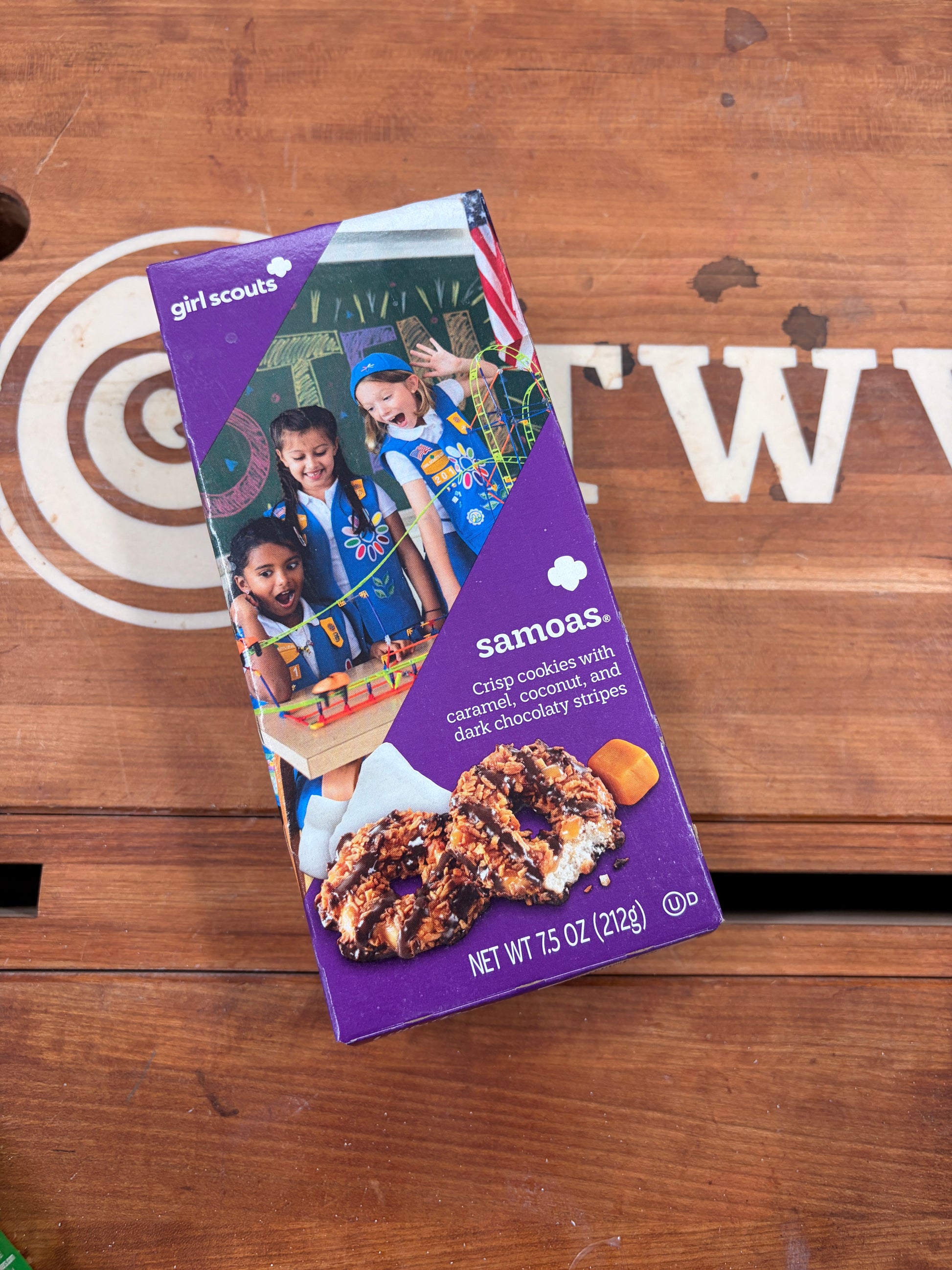 Samsas cookie package on a wooden surface with a visible brand logo.